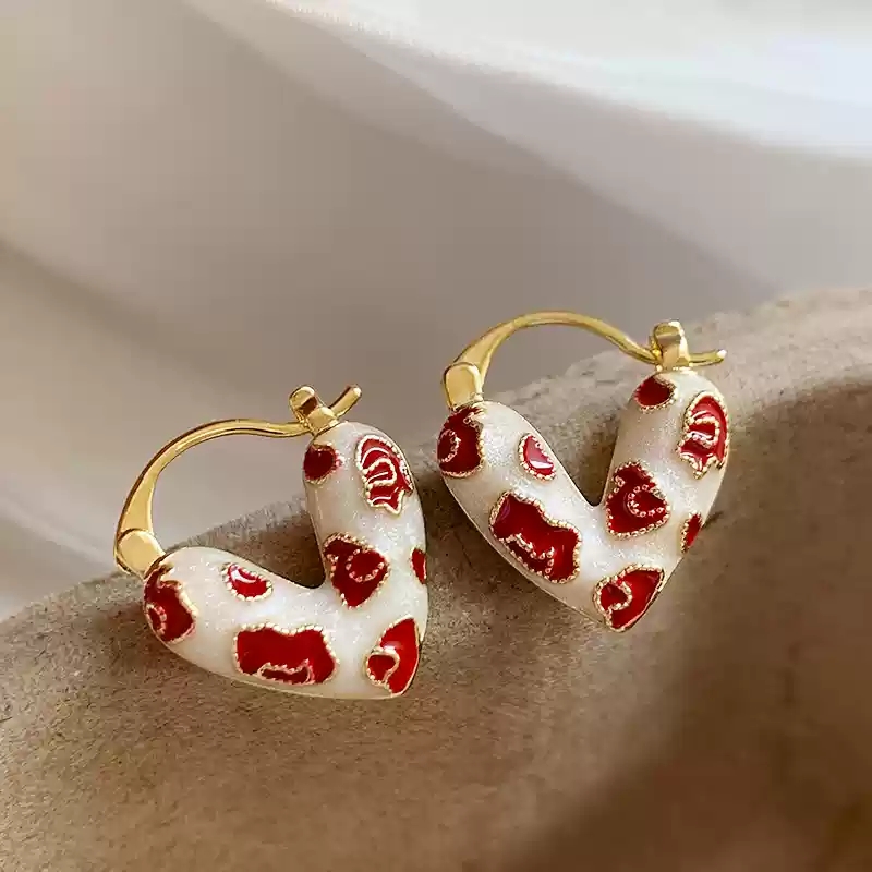 Red striped heart-shaped earrings