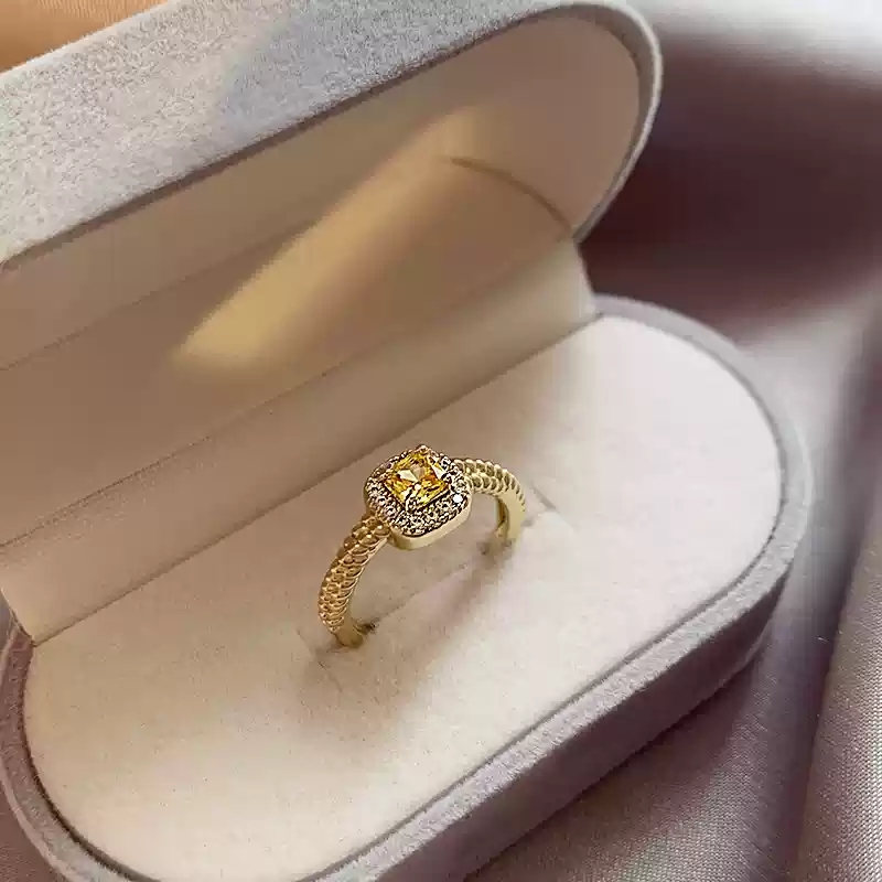 Small sugar yellow diamond ring