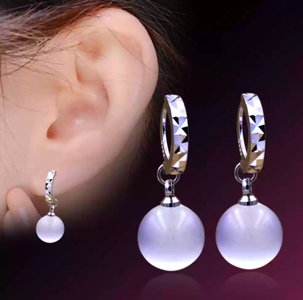 White cat eye earrings