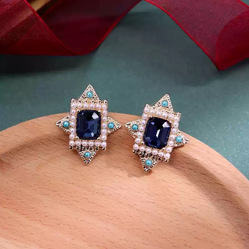 15- Sapphire engraved earrings